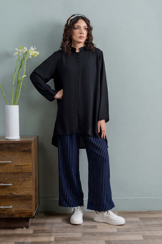 Effortless Elegance in Blue Tunic and Striped Trousers
