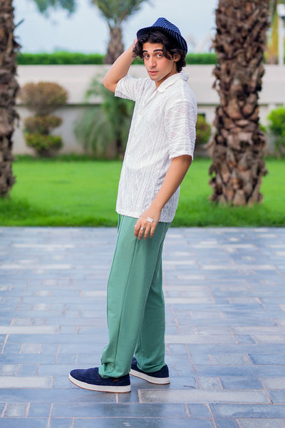 Luxury White Embroidered Shirt with Elegant Green Trousers