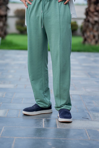 Luxury White Embroidered Shirt with Elegant Green Trousers