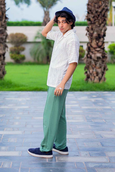 Luxury White Embroidered Shirt with Elegant Green Trousers