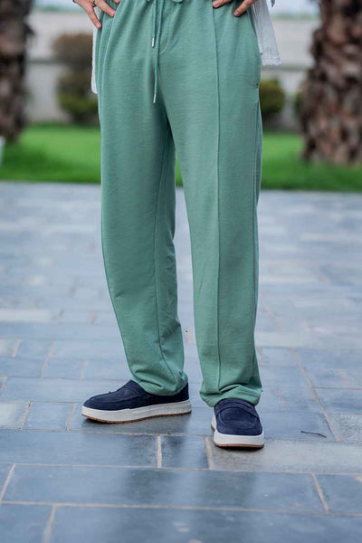 Luxury White Embroidered Shirt with Elegant Green Trousers