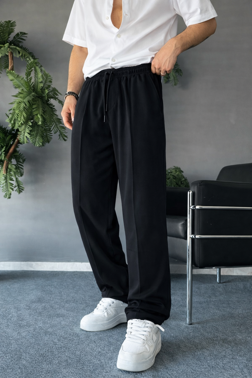 
                          Noir Relaxed-Fit Trousers - Black Ecowears.pk
                        